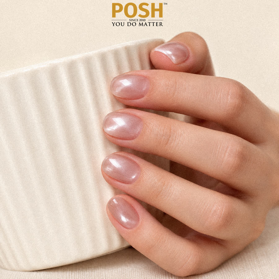 Approved POSH ad image C4-2: cat-eye gel nails around a cream ribbed cup. No words. No words on it.